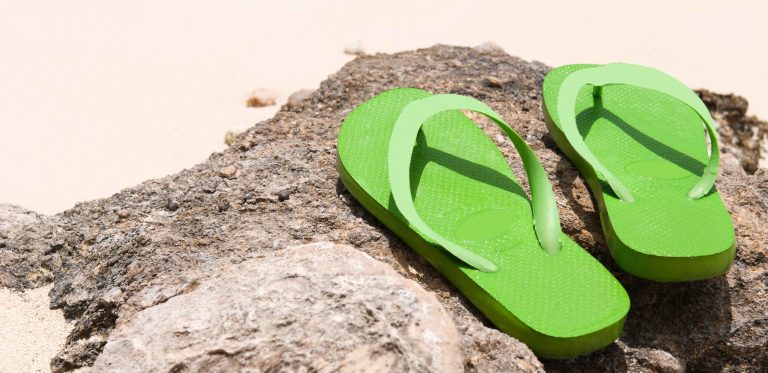 flip flops on the beach zJCwX 0  scaled